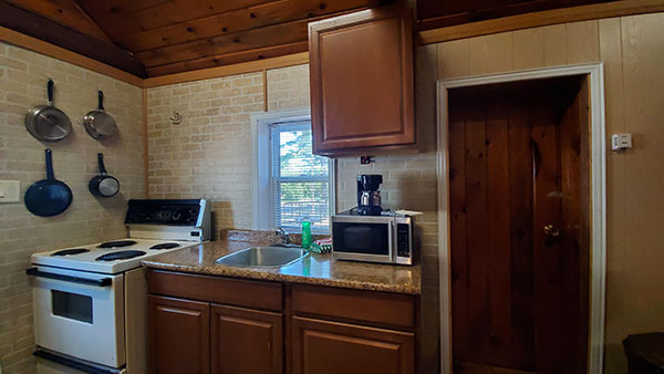 Key Marine Resort rustic cabins with kitchenettes and firepits.